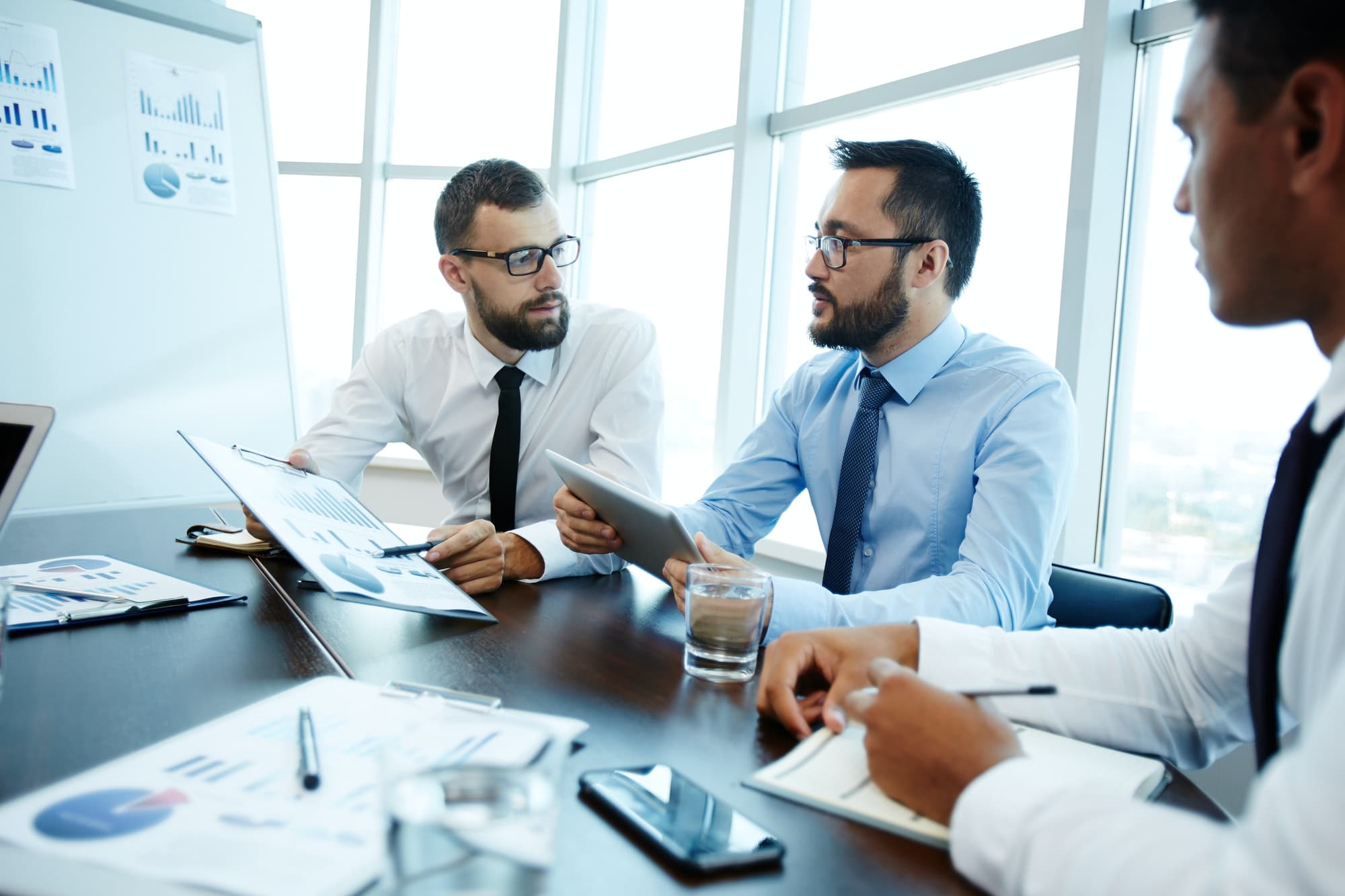 Sachin Mehta discussing loan options with a client